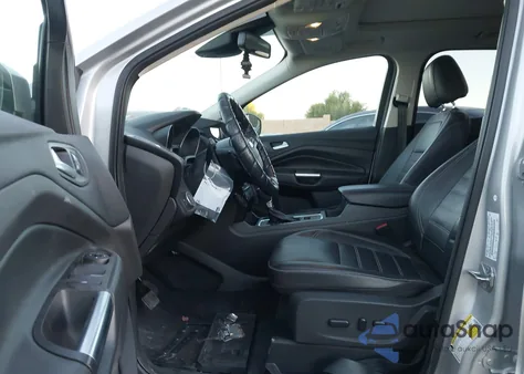 2017 Ford Escape Titanium z USA, uszkodzony, nr VIN 1FMCU0J94HUC80309